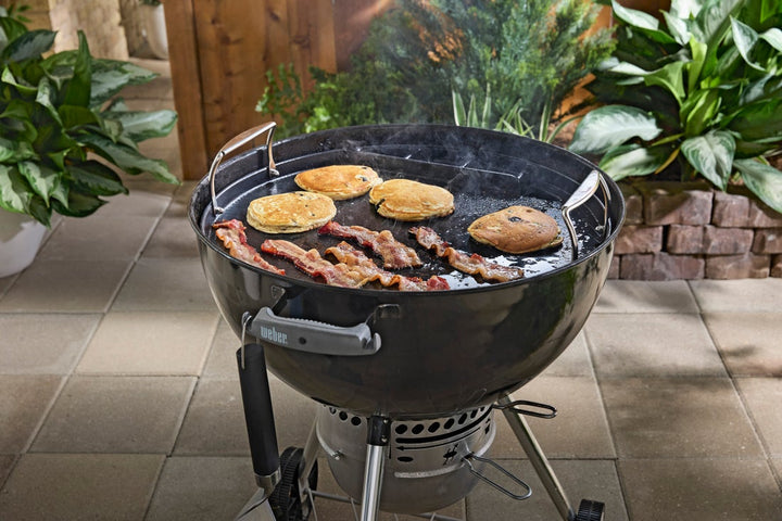 Weber Full-Size Griddle sitting in a Weber Master-touch