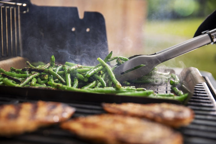 Grilling vegetables on a Weber stainless steel tray