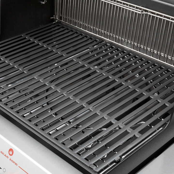 Cast iron grill grates in a Weber Genesis barbecue