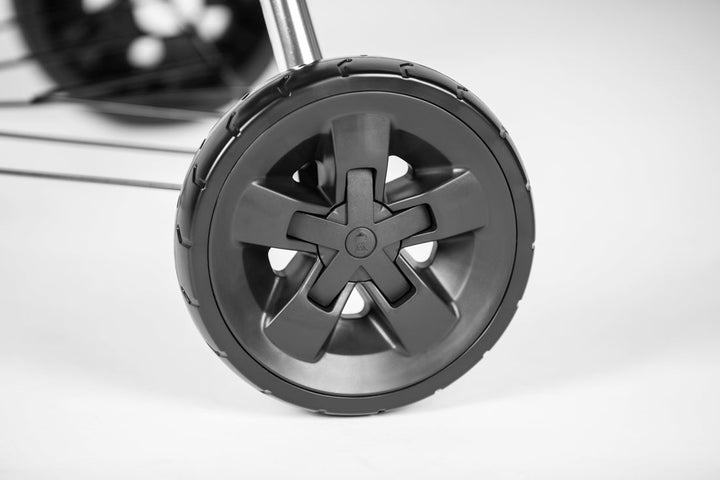 Wheel from a Weber E-5775 on a white background